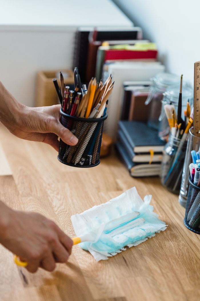 Mastering the First Impression: Your intriguing post title goes here A clean, organized desk with stationery and dusting supplies for efficient workspace.